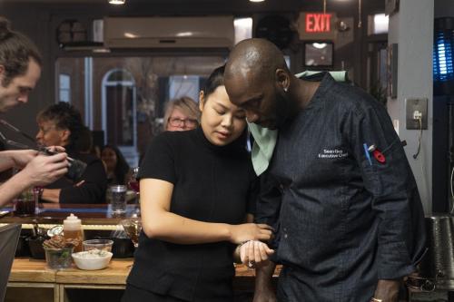 Executive Chef Sean Guy and hostess Anunya Camprasert check in while serving the second course for their Jan. 30 Chef's Table event.